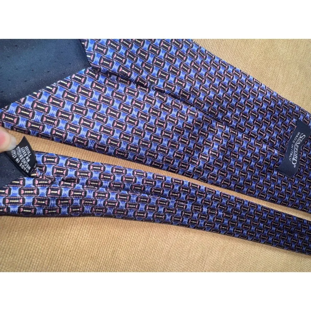 Roberto Villini ties roberto